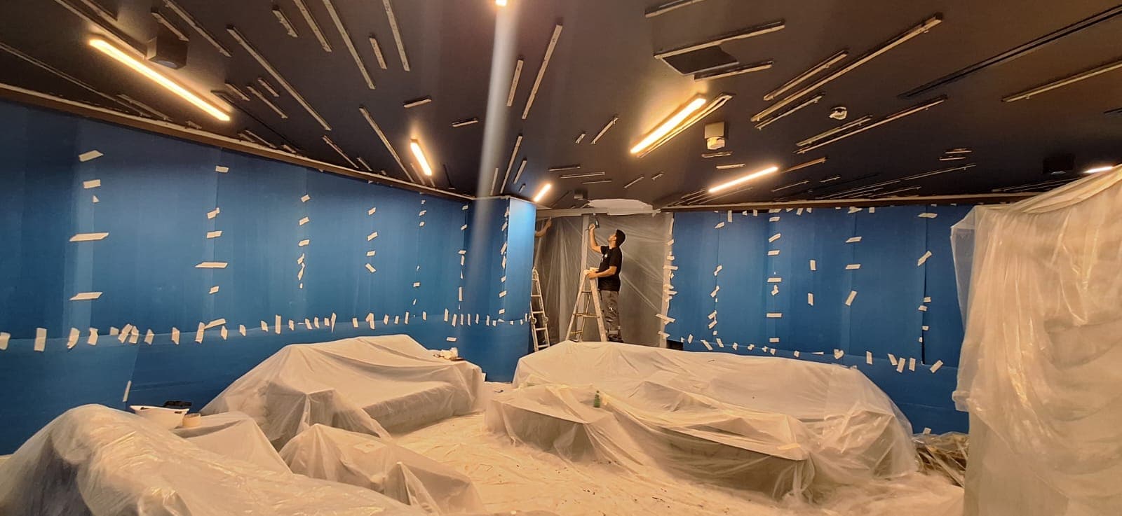 Interior painting works with furniture protected